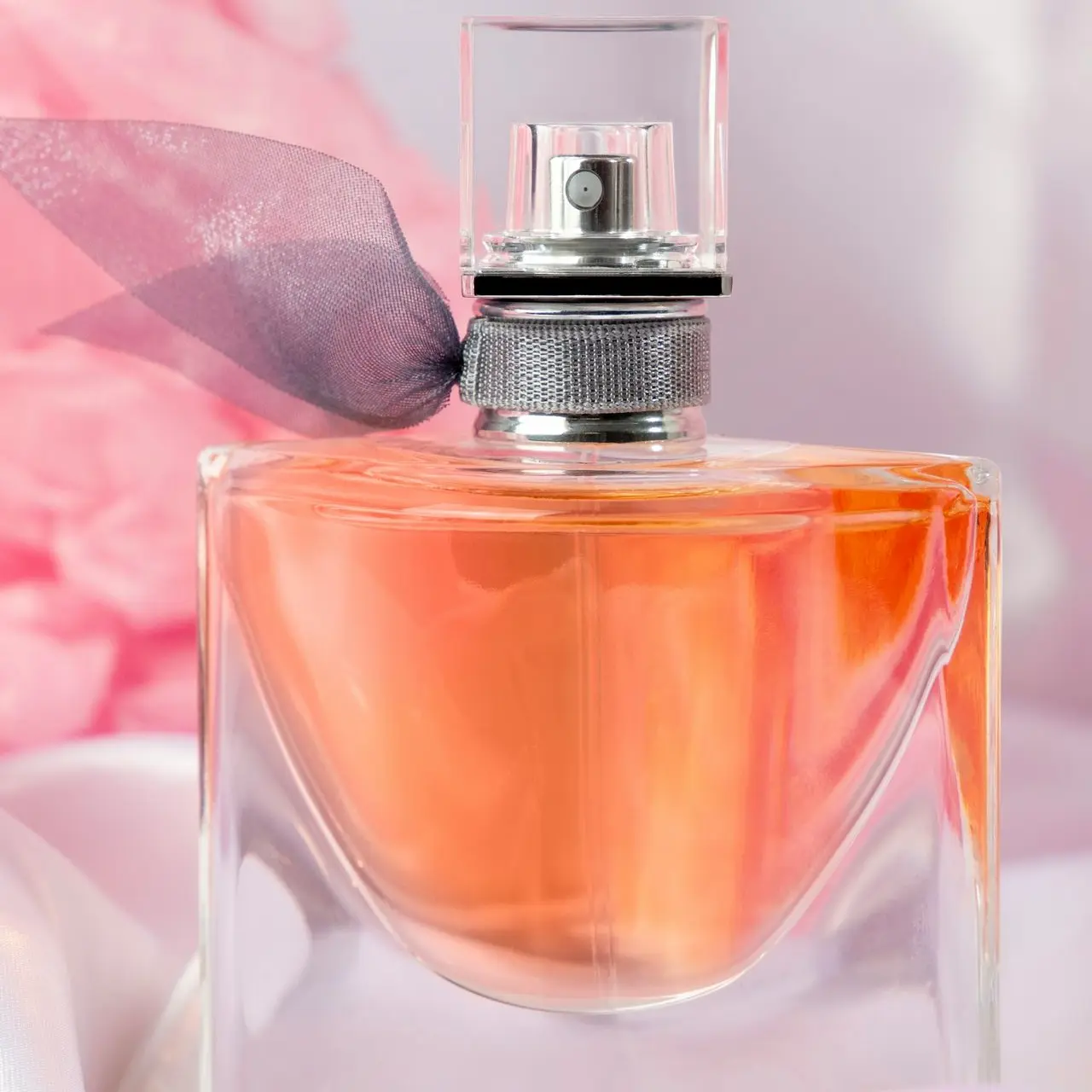pink and silver perfume bottle